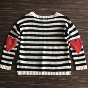 Striped sweater with heart elbow patches